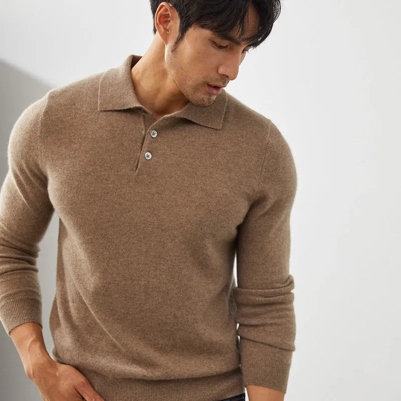 Man wearing a sapphire blue cashmere short sleeve pullover sweater with a polo collar.