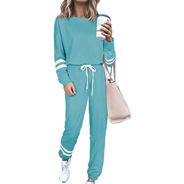 Women's plus size casual suit set in loose fit with long sleeves, shown in a solid colour.