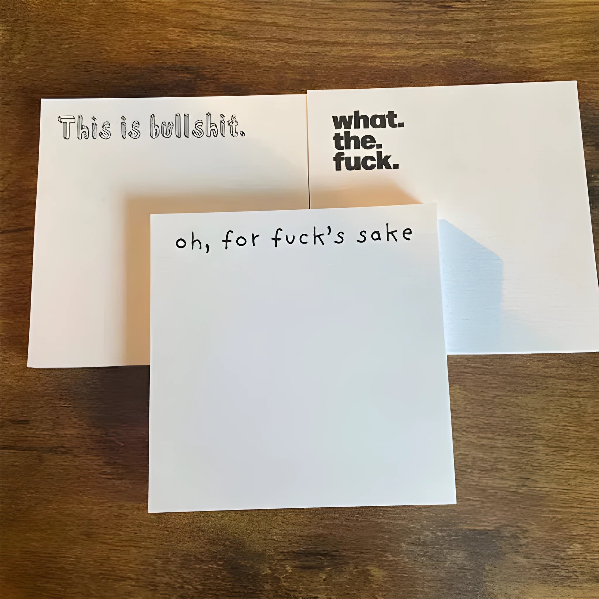 Square 7.5cm sticky notes with colourful English phrase covers and adhesive backing