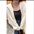 Korean style women's long hooded knit cardigan in oatmeal colour, loose fit.