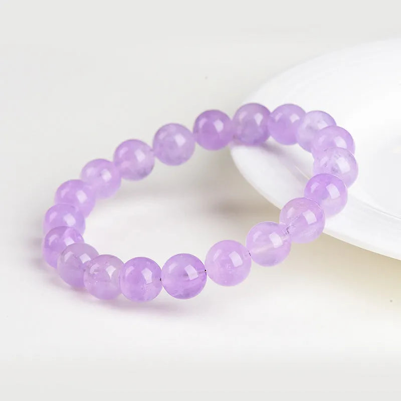 Lavender amethyst crystal bracelet with round beads in water ripple geometric pattern