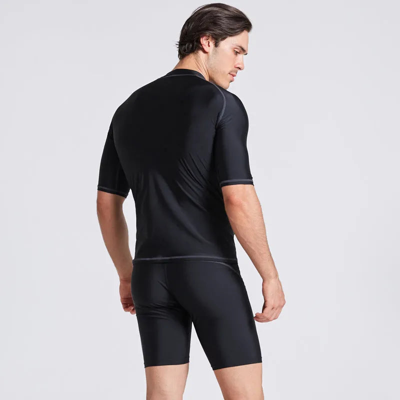 Men's navy blue half sleeve swimsuit top and pants set for swimming