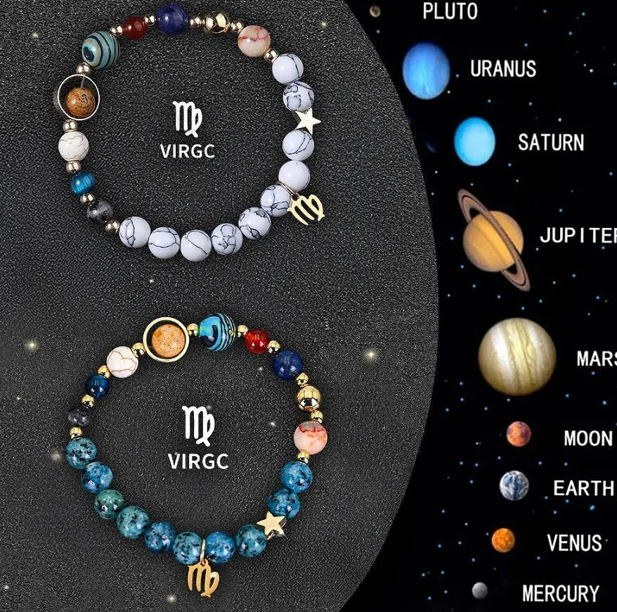 Set of twelve natural stone bead bracelets laid out, each representing a different zodiac sign.