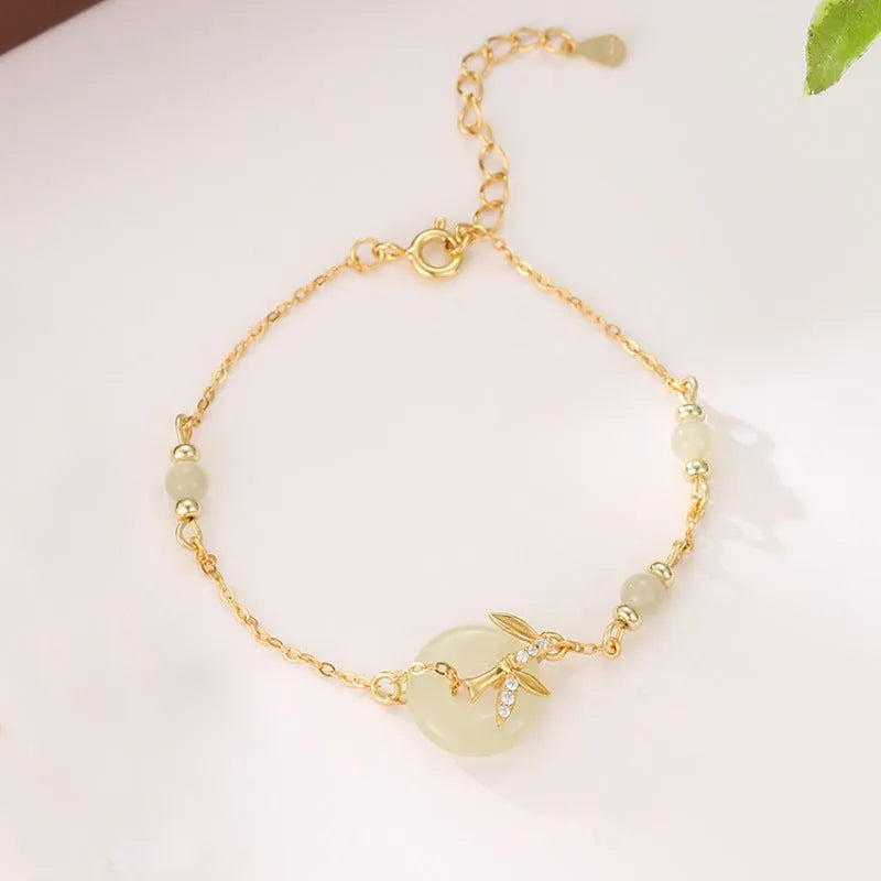 Women's Hetian Jade safety buckle bracelet in antique style with peace buckle design on 925 silver