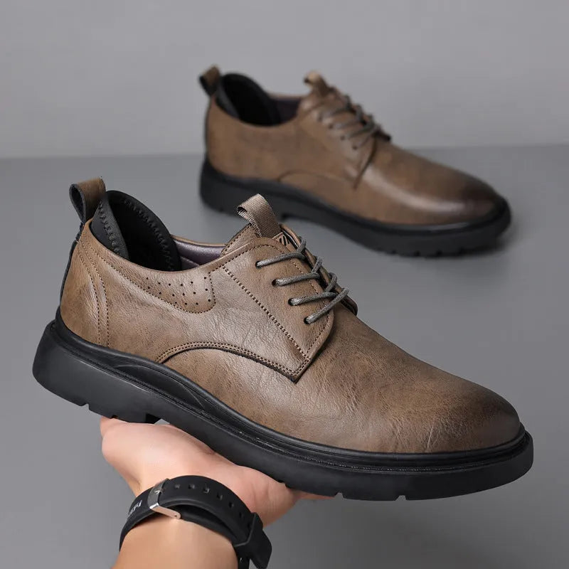 Men's black leather shoes with decorative sewing lines and rubber soles for business and wedding wear