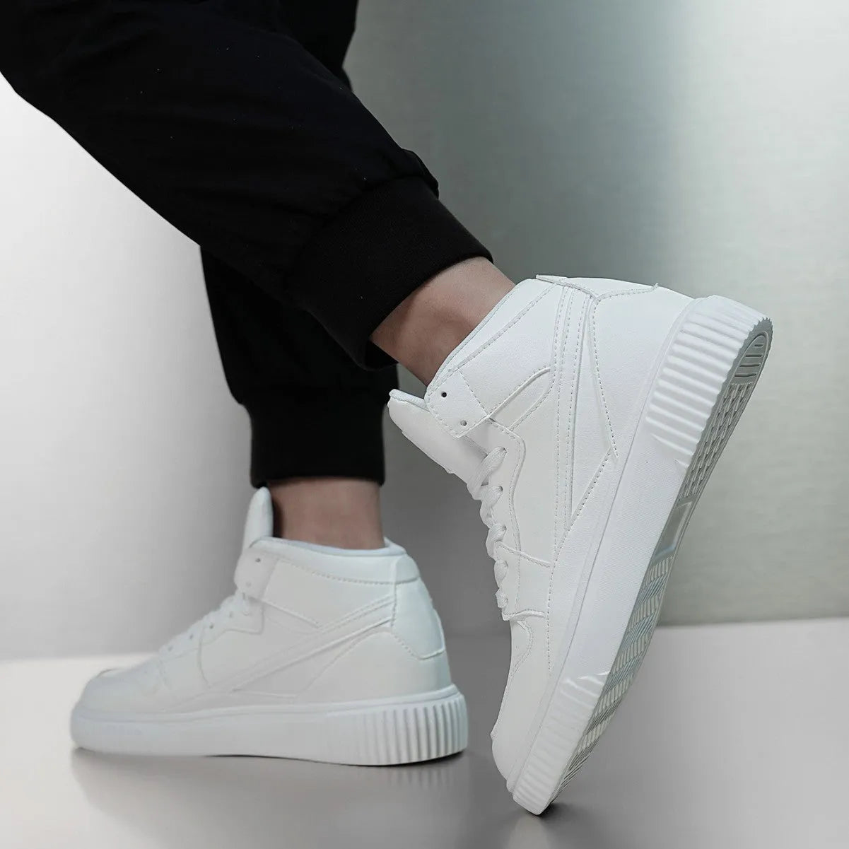 Men's white round-toe casual shoes made from microfiber material.