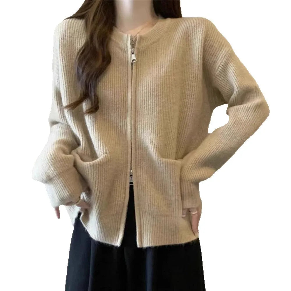 Beige viscose women's sweater coat cardigan with long sleeves laid flat.