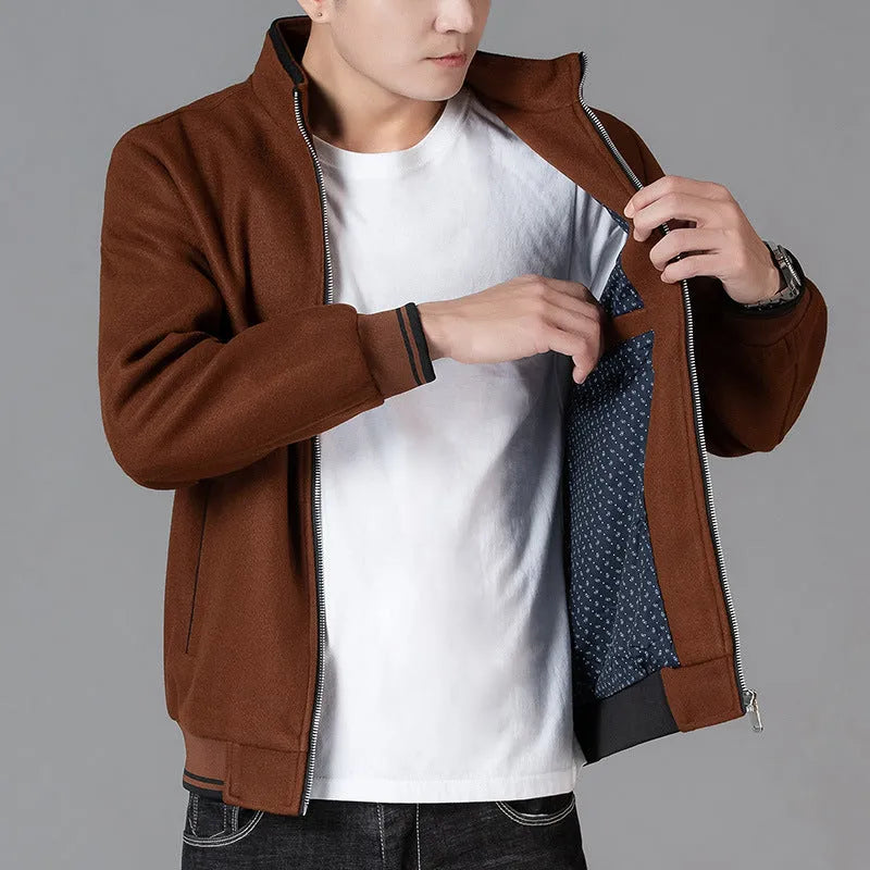 Men's grey fleece zip-up jacket with side pockets on a hanger