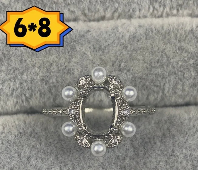 Korean style oval denier ring ornament with 6x8mm stone and star detail on electroplated copper.