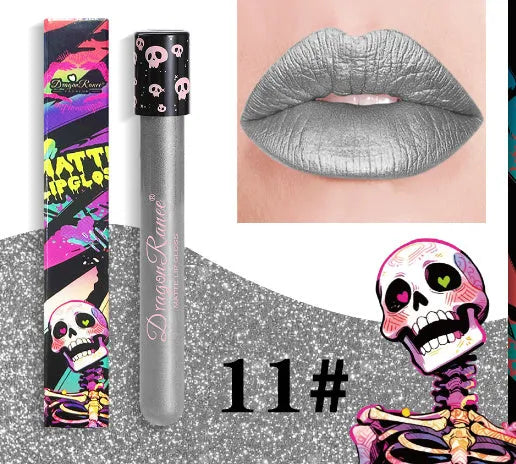 Halloween creative makeup lip gloss in skull-shaped test tube packaging, showing a matte gold and silver finish.