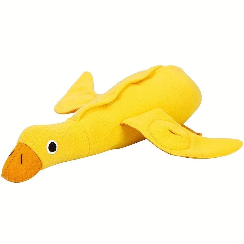 Yellow plush duck dog toy with treat compartments and squeaker for training
