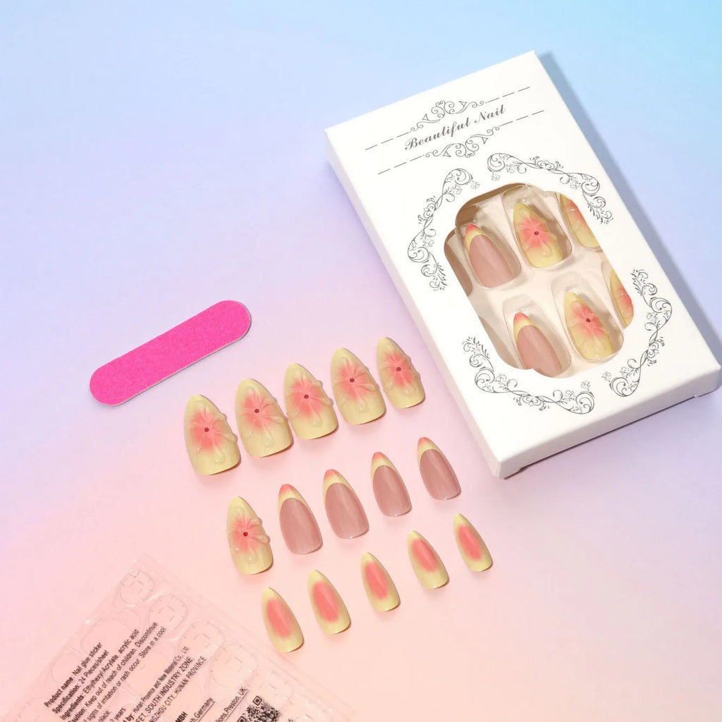 Set of pink cartoon flower fake nails with wearable armour, jelly glue, and file on a white background.