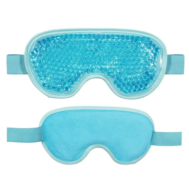 White portable rechargeable eye massager device with hot compress function and included eye mask