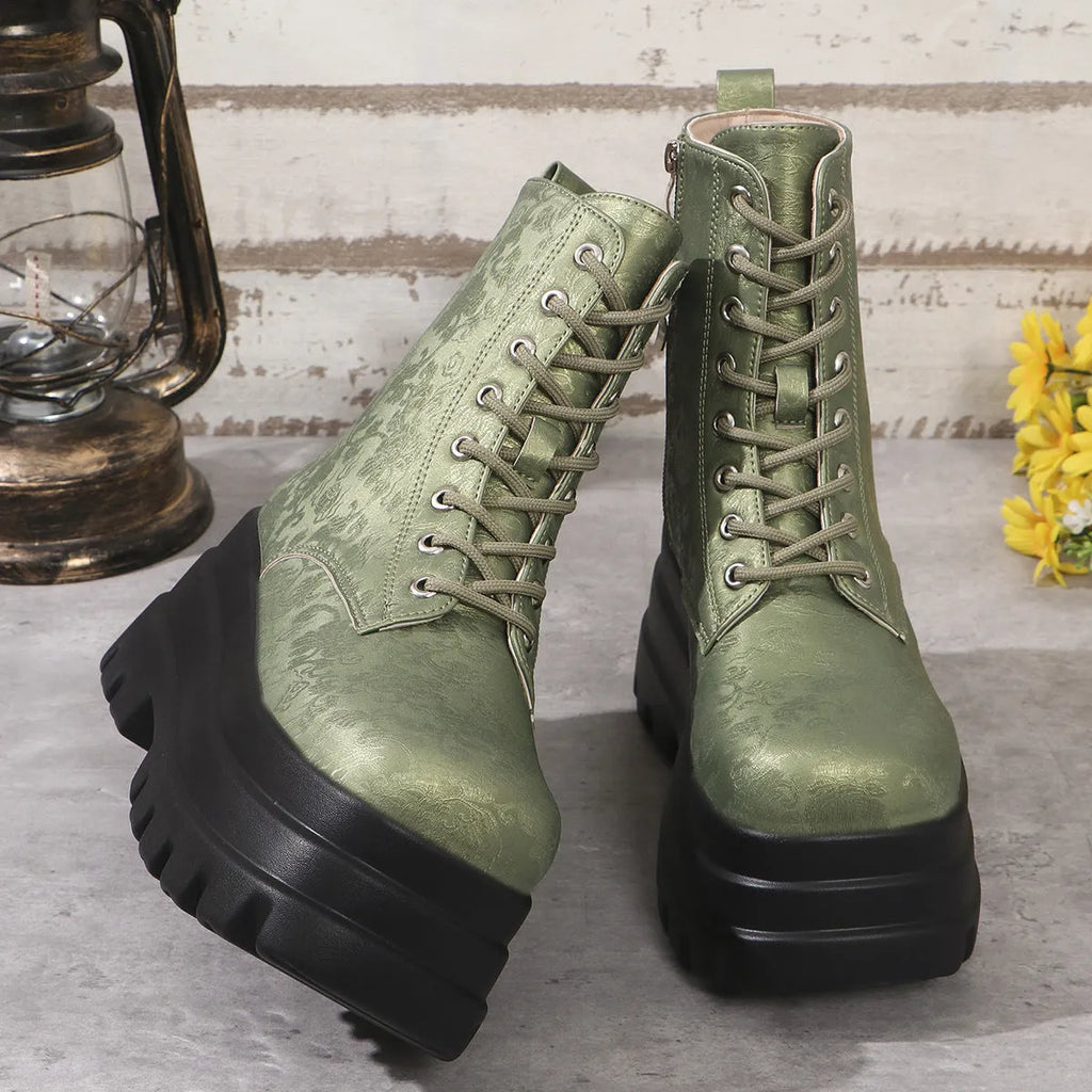 Women's black patchwork platform Martin boots with a chunky heel and side zipper.