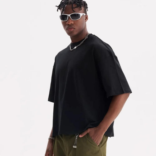 American style loose fit pure cotton t-shirt in apricot colour on a hanger.