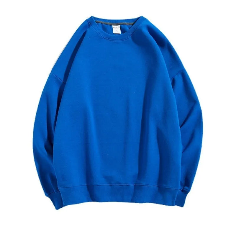 Women's loose fit cotton off shoulder sweater in a solid colour with round neck and long sleeves.