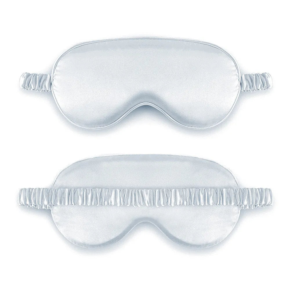 Double-sided Rayon elastic satin sleep mask shown in multiple colour options including sky blue, black, wine red, and light pink.