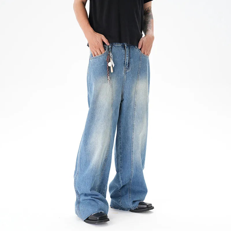 Light blue washed vintage women's wide leg jeans with a machete cut design on a front zip fly.