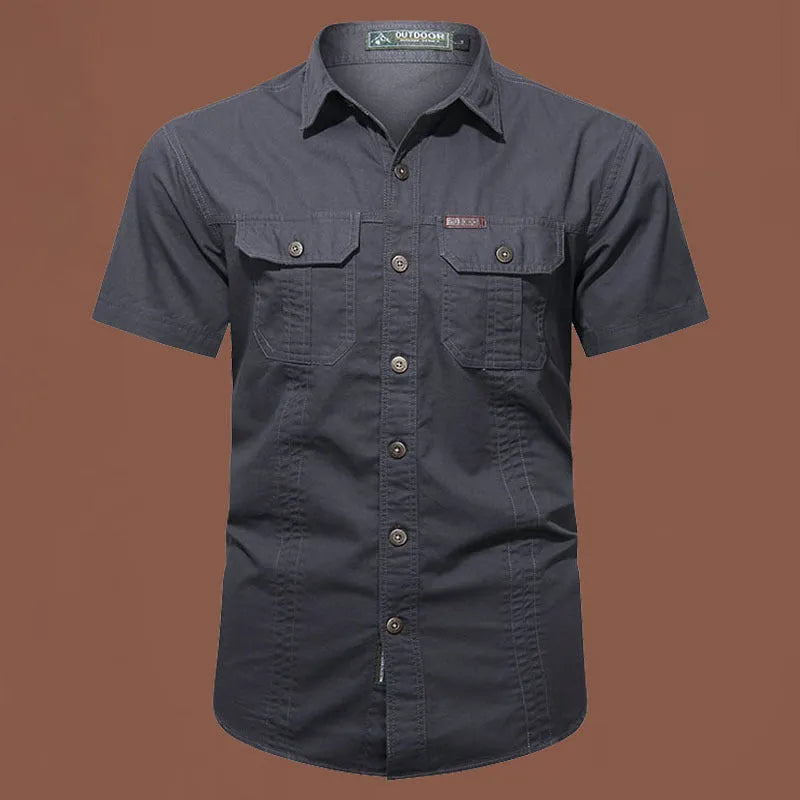 Men's short sleeve cotton work shirt in a loose fit, shown in army green colour.