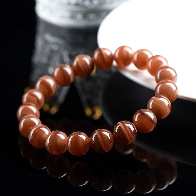 Natural rhodochrosite round bead bracelet from Peru in 6mm or 8mm size
