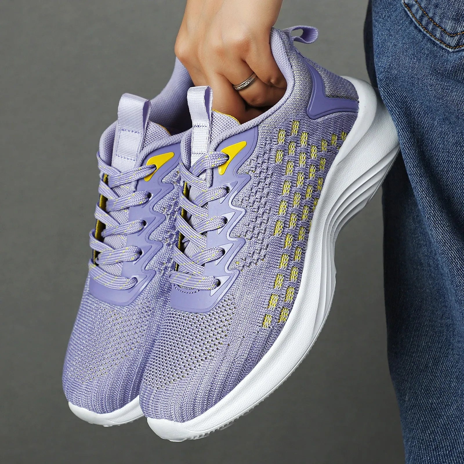 Women's lavender purple Flyknit running shoes with striped pattern and EVA sole