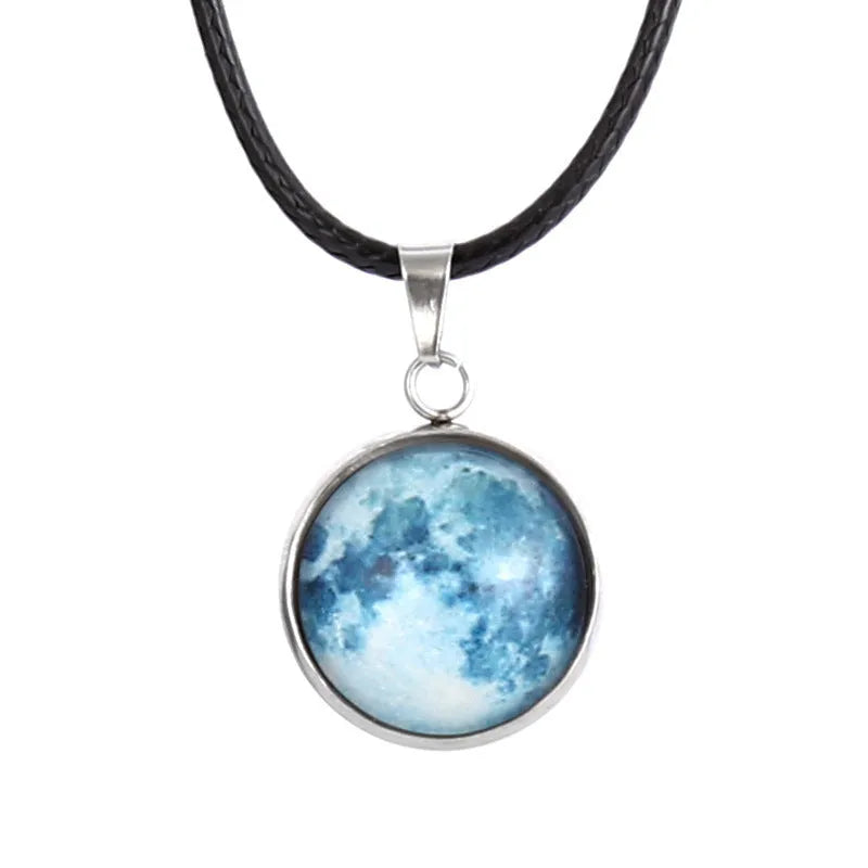 Alloy necklace with luminous glass pendant showing Christmas moon night sky and constellation design.