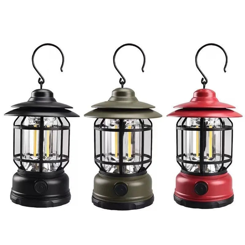 Dark green portable camping lantern with super bright LEDs, shown with a dry battery for scale.