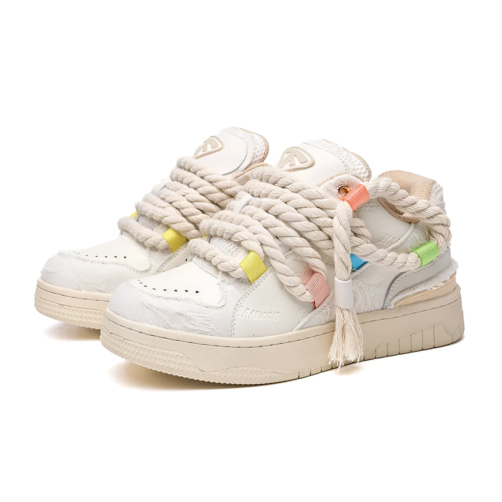 Creamy white retro low-top skateboard shoes with platform heel and lace-up front.