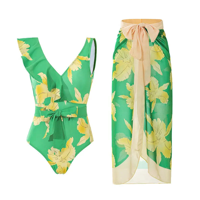 Solid colour women's one-piece swimsuit with spaghetti straps and an attached skirt.