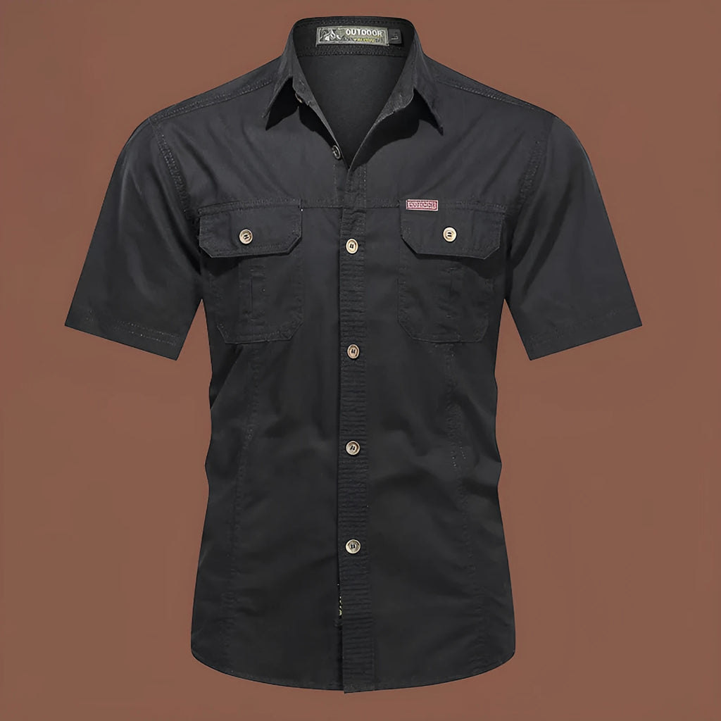 Men's short sleeve cotton work shirt in a loose fit, shown in army green colour.