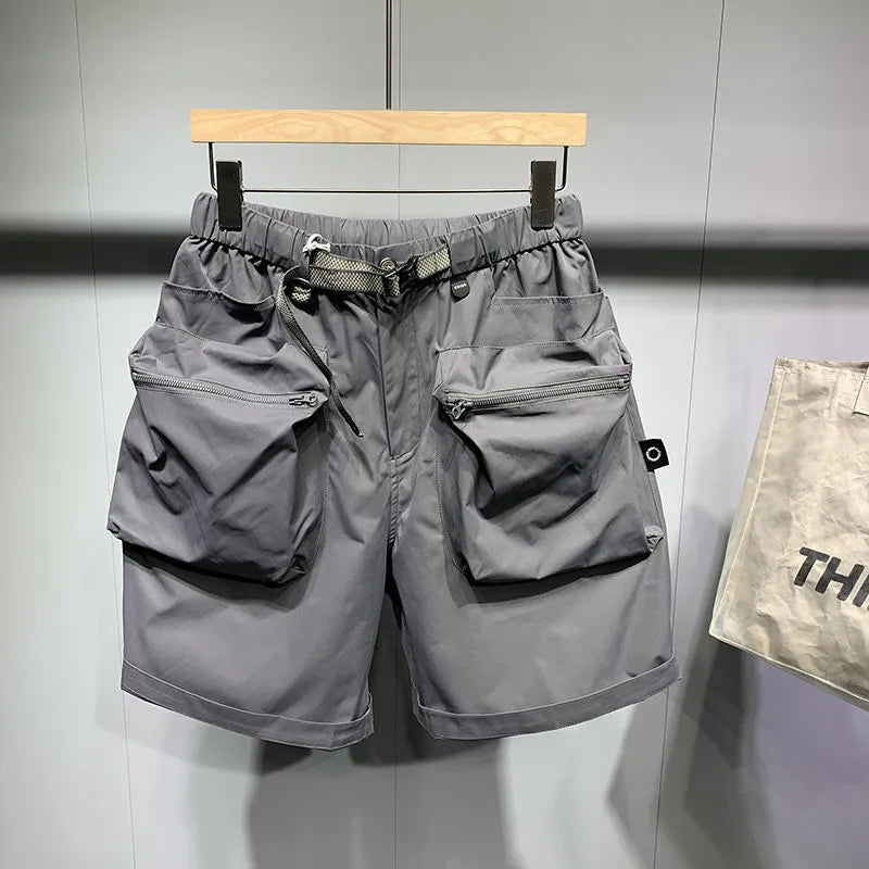Men's large size work shorts with pockets in black or grey with loose fit design