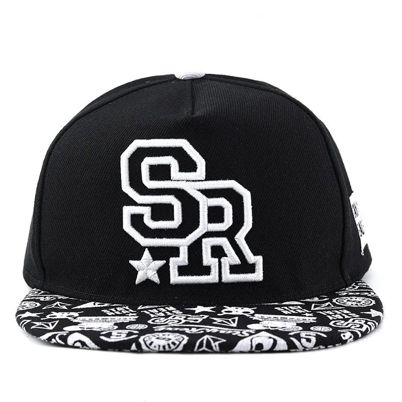 Cotton baseball hat with embroidered letters on a dome crown, shown in black and white.
