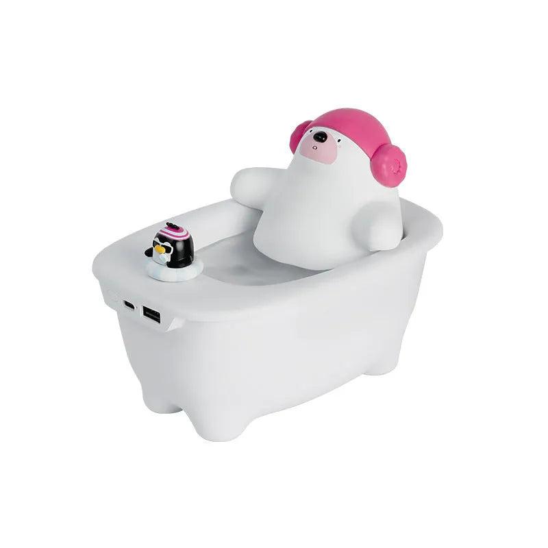 White polar bear-shaped USB air humidifier with water tank on a desk.