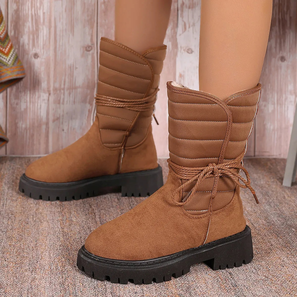 Women's black suede snow boots with chunky heel, lace-up front and fleece lining