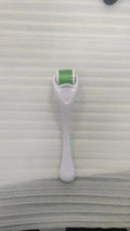 540 micro needle derma roller showing handle and needle wheel in a selected colour