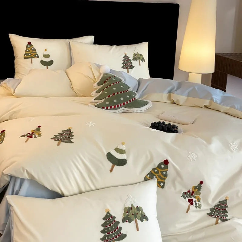 Cotton four-piece bedding set with embroidered Christmas tree towel design on duvet cover