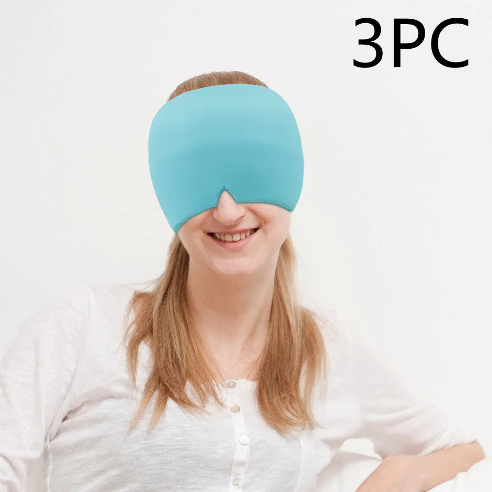 Black adjustable cold compress gel eye mask for headache relief on a plain background.