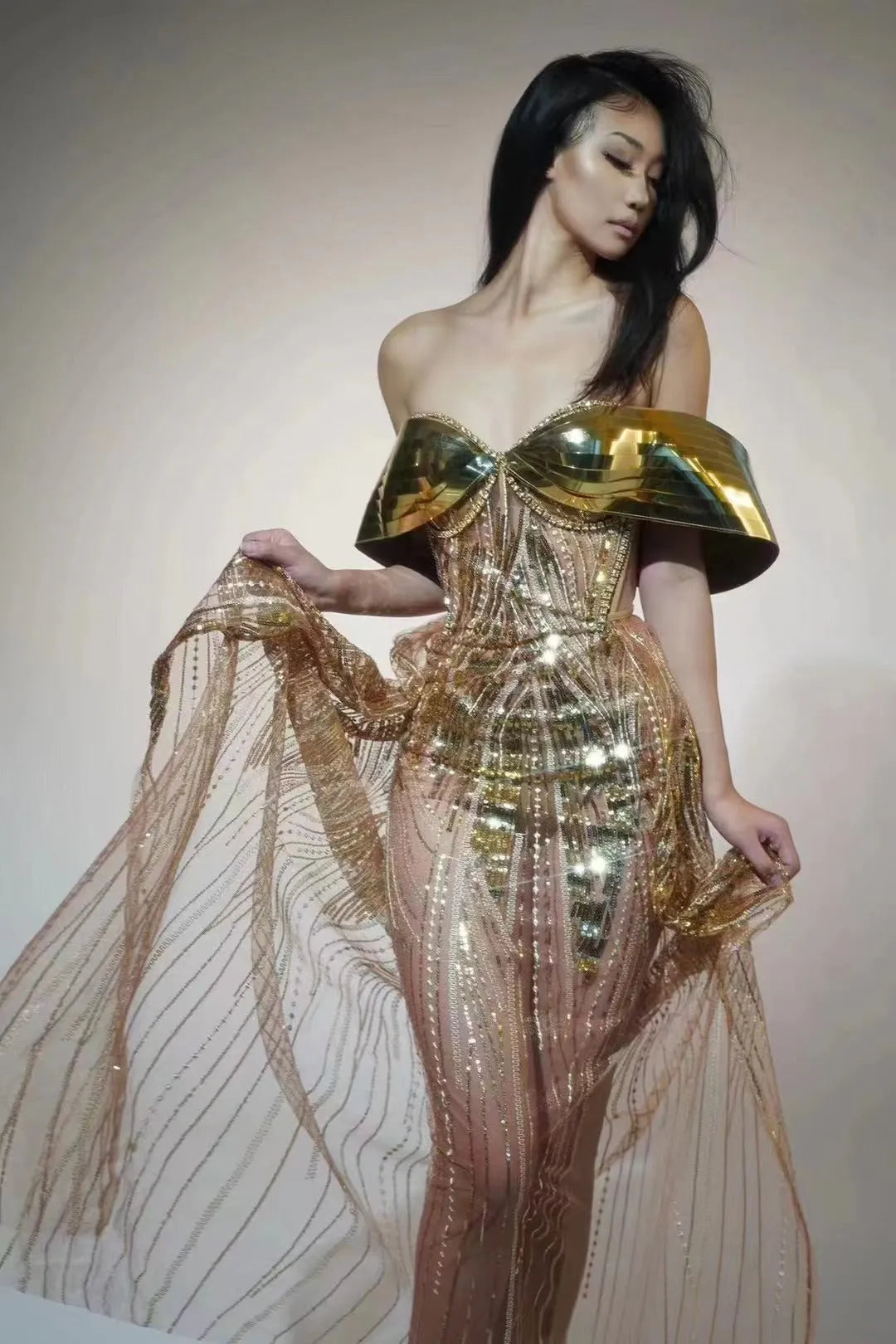 Gold women's strapless sequined dress with a split tulle skirt, long length, and mid waist fit
