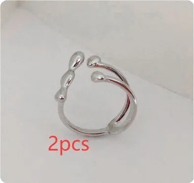 Brass women's fashion ring with spherical design in gold or silver adjustable ring