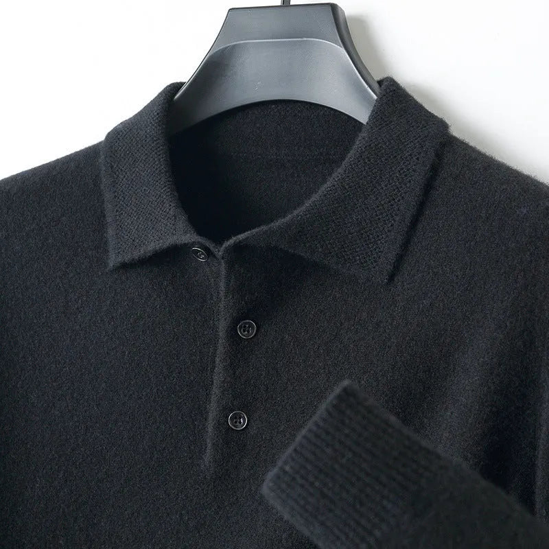 Man wearing a men's grey polo collar wool sweater pullover with long sleeves.