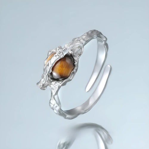 Adjustable opening Saturn ring in electroplated white gold colour with silver construction