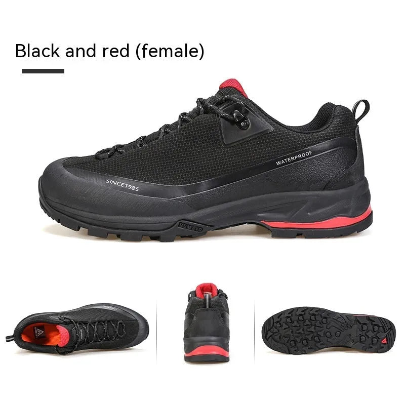 Men's low-top hiking boots in black with a leather mesh upper and rugged rubber outsole.