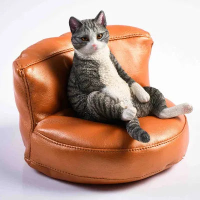 Lazy cat resin car dashboard ornament with sofa, 7.5cm tall