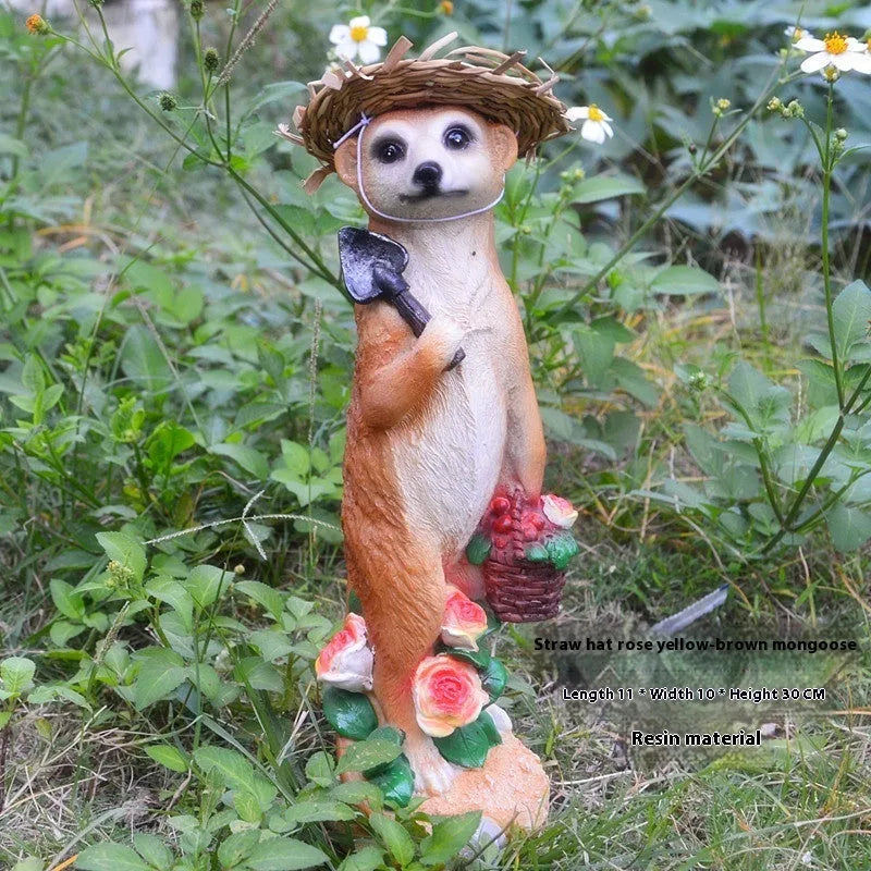 Straw hat mongoose ornament set with gardening tools in yellow brown and straw colour variations