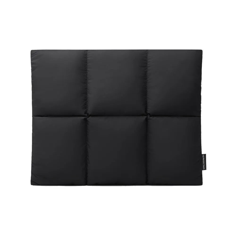 Soft black polyester laptop sleeve for a 15.6-inch device with sewing thread detail.