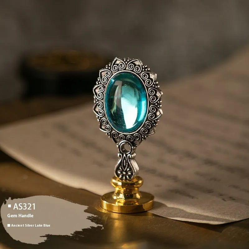 Wooden wax seal handle in a selection of different colour and decorative finishes.