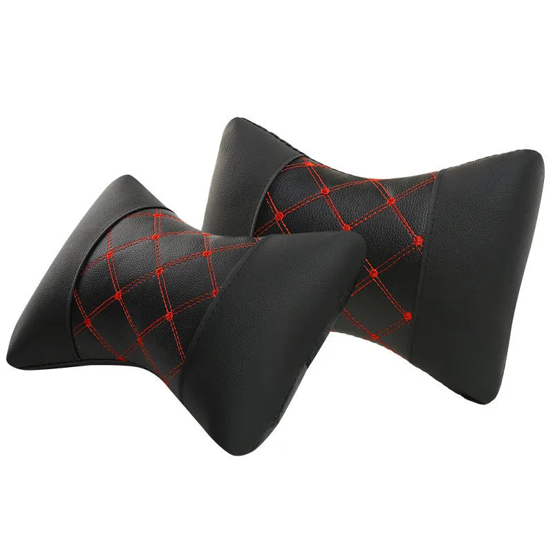 Black leather quilted car headrest pillow with contrast piping for cervical neck support
