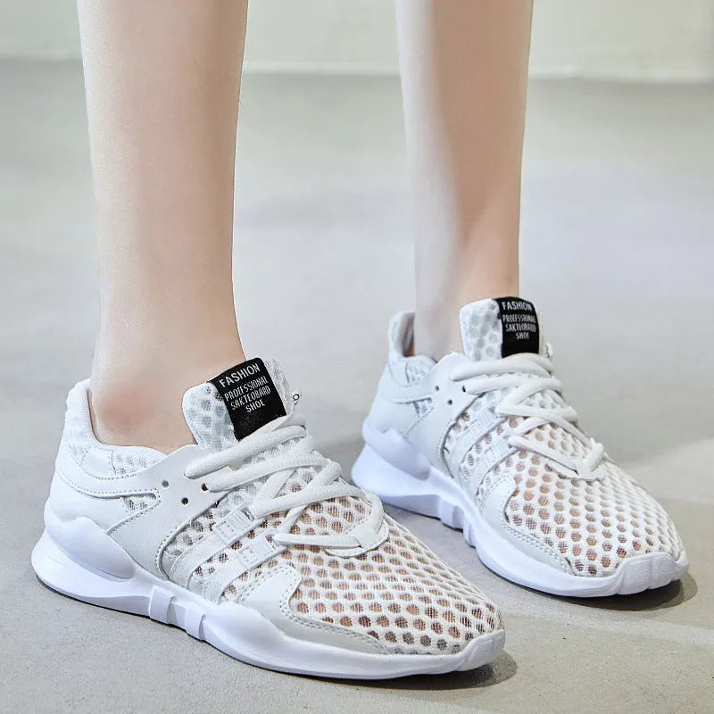 Low-top casual sneaker with mesh hollow-out upper and flat EVA sole in white.