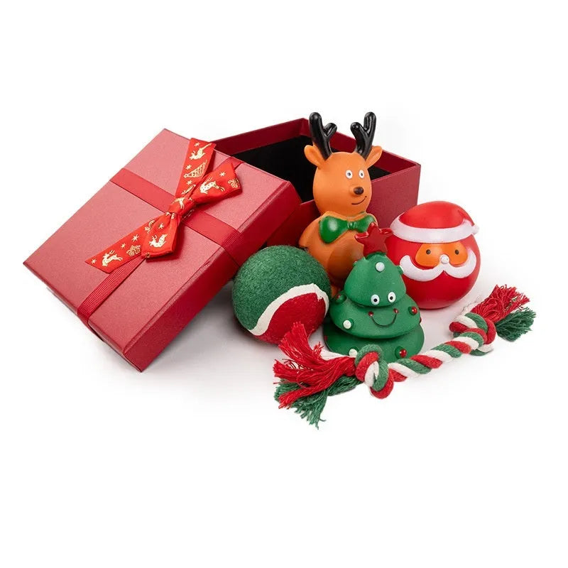 Set of colourful Christmas-themed vinyl dog chew toys including balls, ropes, and Santa figures.