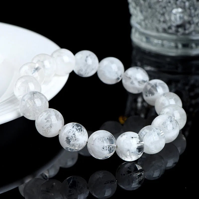 Natural blizzard snowflake round crystal bead women's bracelet with Ruyi and Xiangyun design.